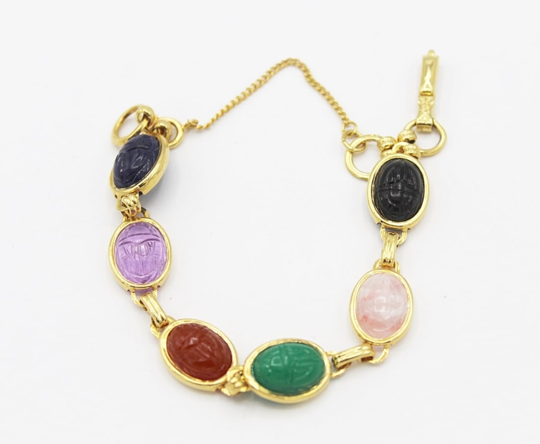 RARE VINTAGE CORO SCARAB SIGNED BRACELET: "LUCKY" EGYPTIAN SYMBOL. GOLD-TONED. 7". ESTIMATE: $75-$100