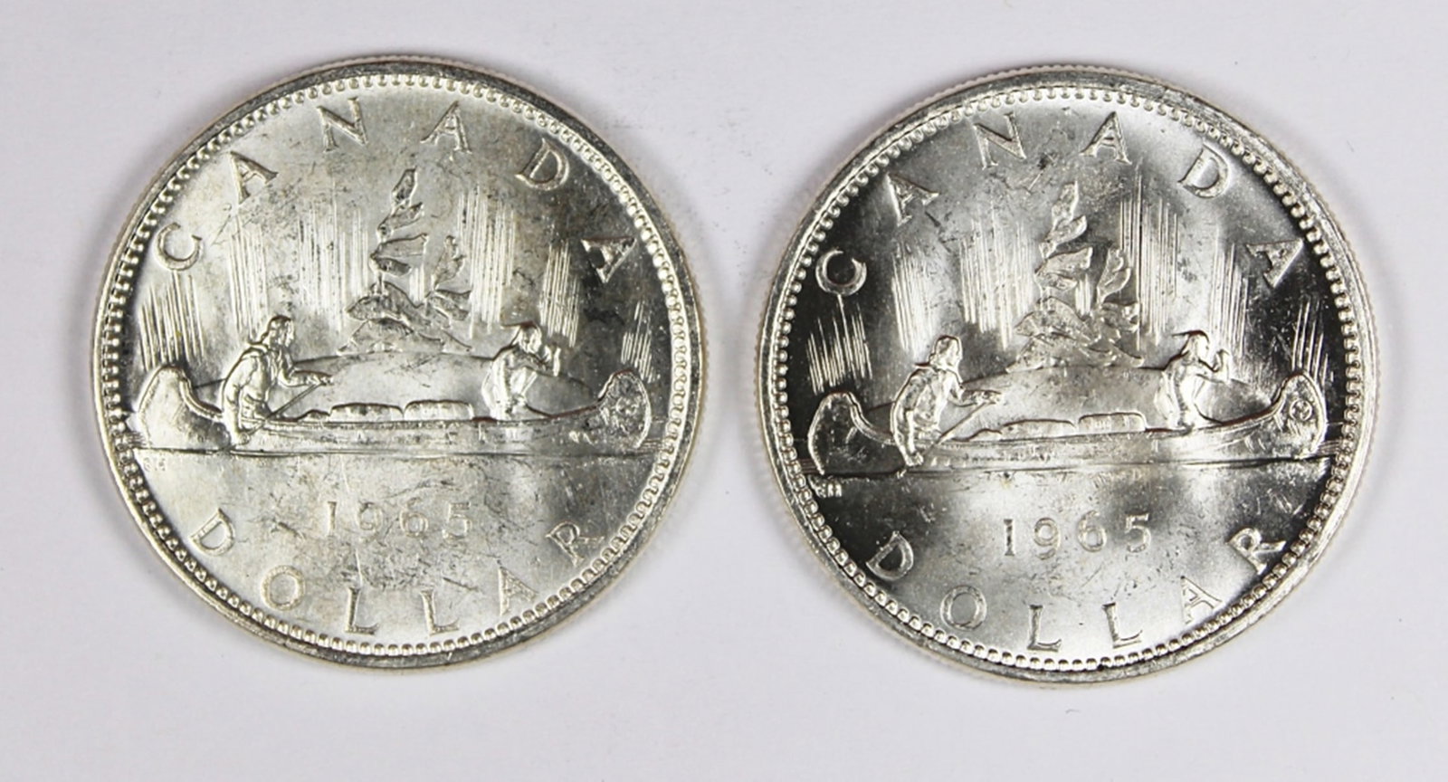 (2) 1965 CANADA SILVER DOLLARS (1 of 2)