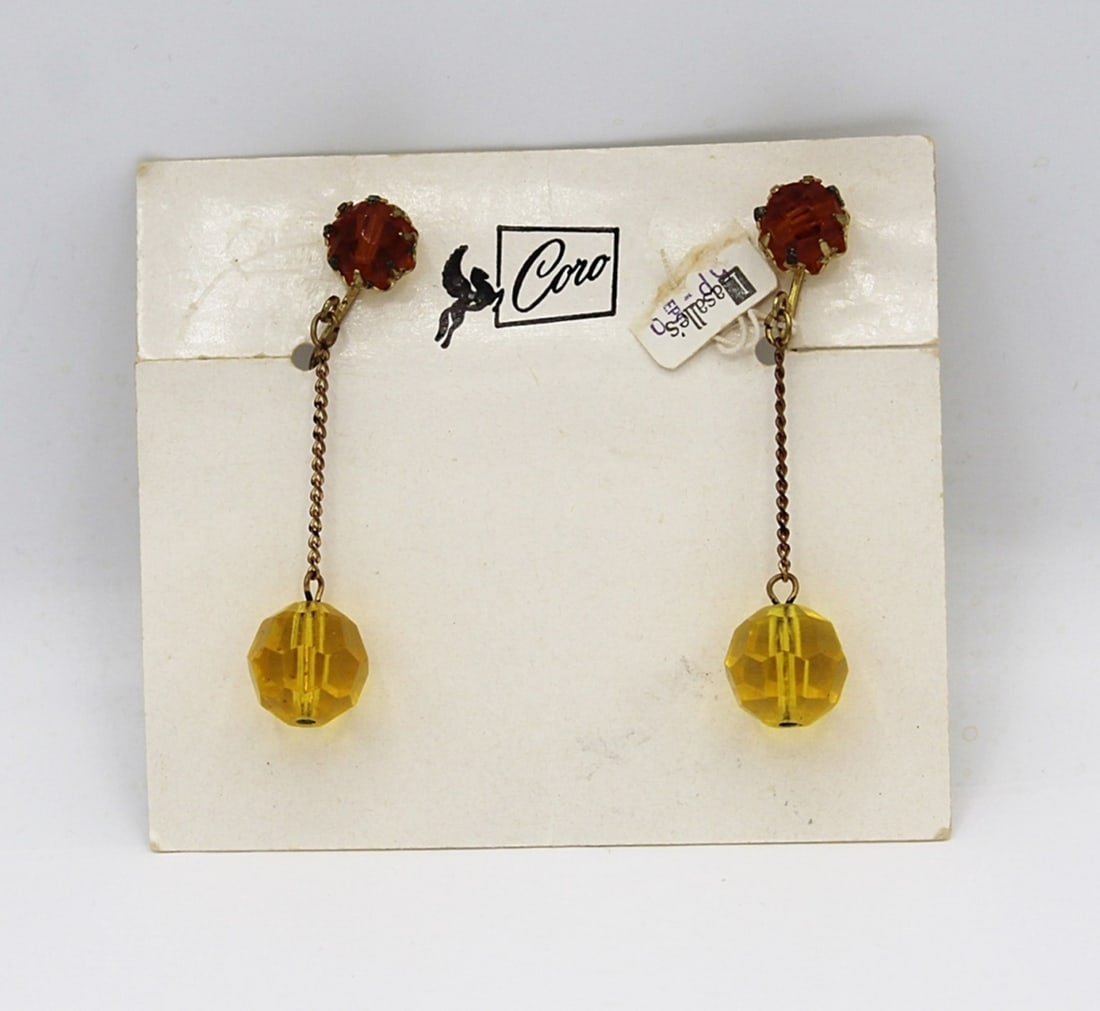 VINTAGE SIGNED "CORO" EARRINGS: GOLD-TONED. CLIP BACK. 2". ESTIMATE: $25-$50