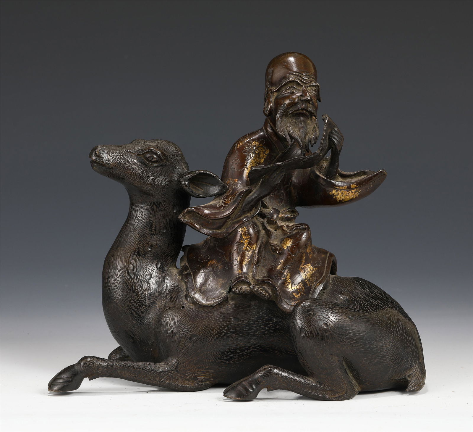 A CHINESE GOLD PAINTED BRONZE FIGURE & ANIMAL (1 of 9)