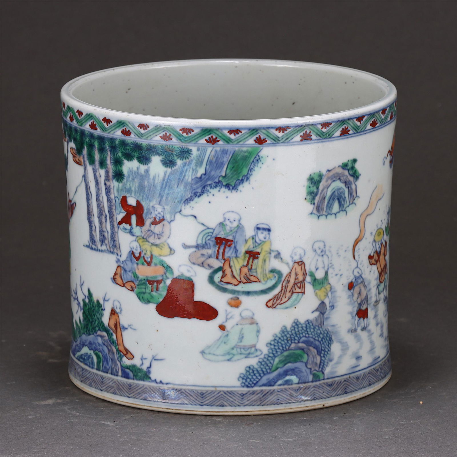 A DOUCAI GLAZED ARHAT GROUP BRUSHPOT (1 of 7)