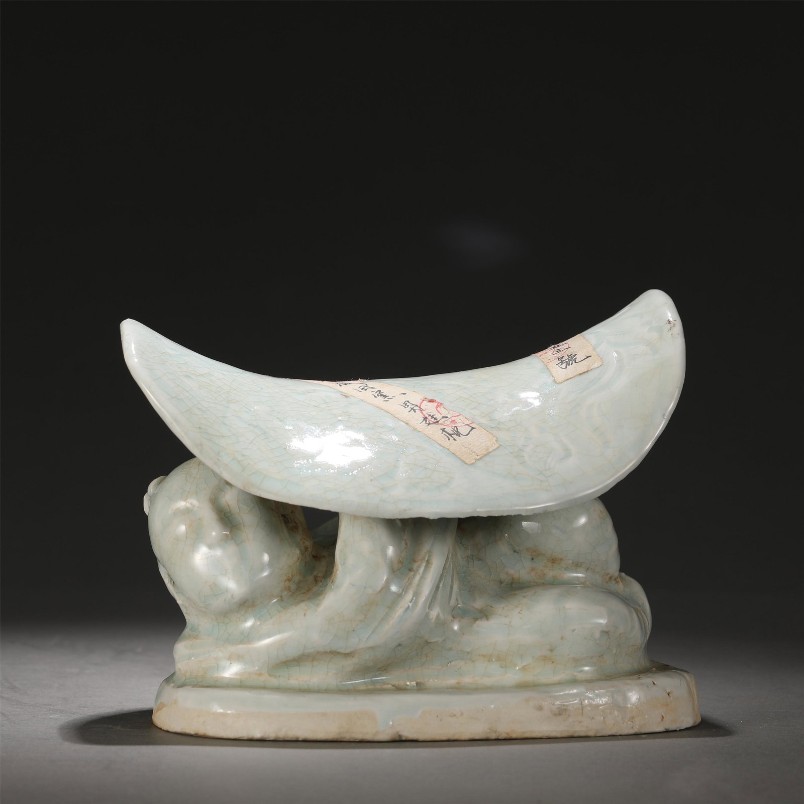 A HUTIAN-TYPE FIGURAL PILLOW: A HUTIAN-TYPE FIGURAL PILLOW Dimension: L. 18 cm. W. 12 cm. H. 14 cm. Weight 1650 grams.