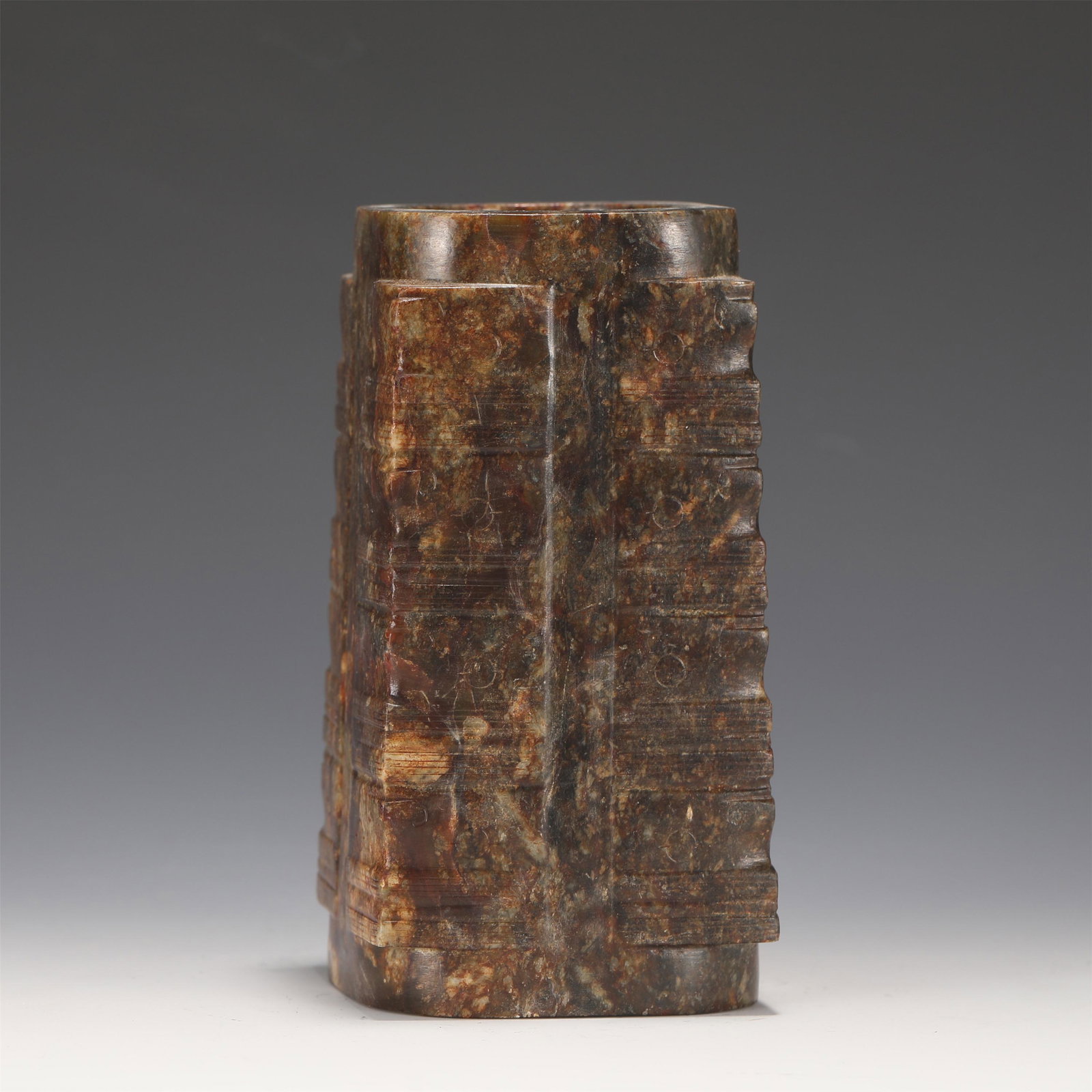 A CARVED RUSSET JADE CONG (1 of 10)