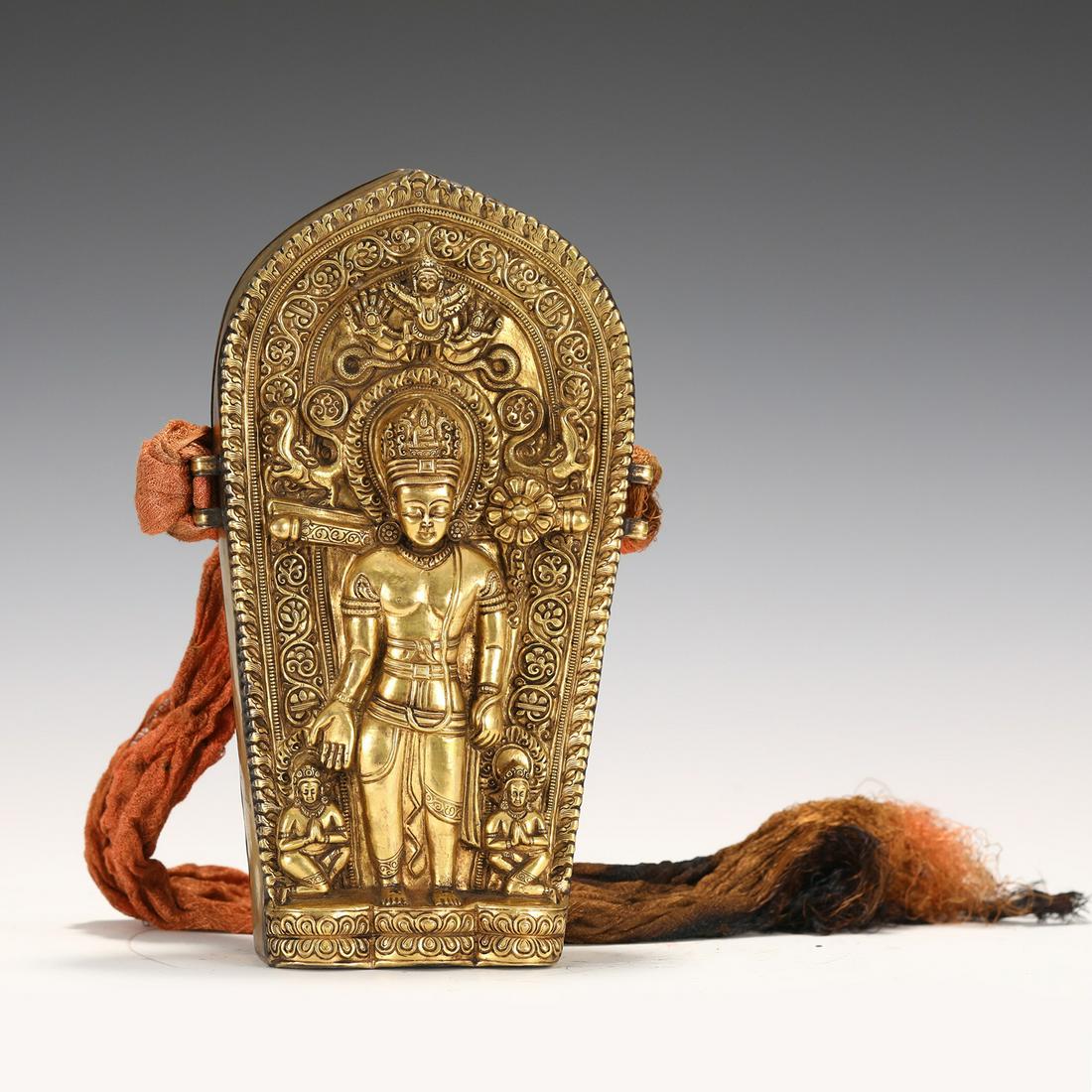 A TIBETAN BRONZE GILT AMULET BOX GU (1 of 9)
