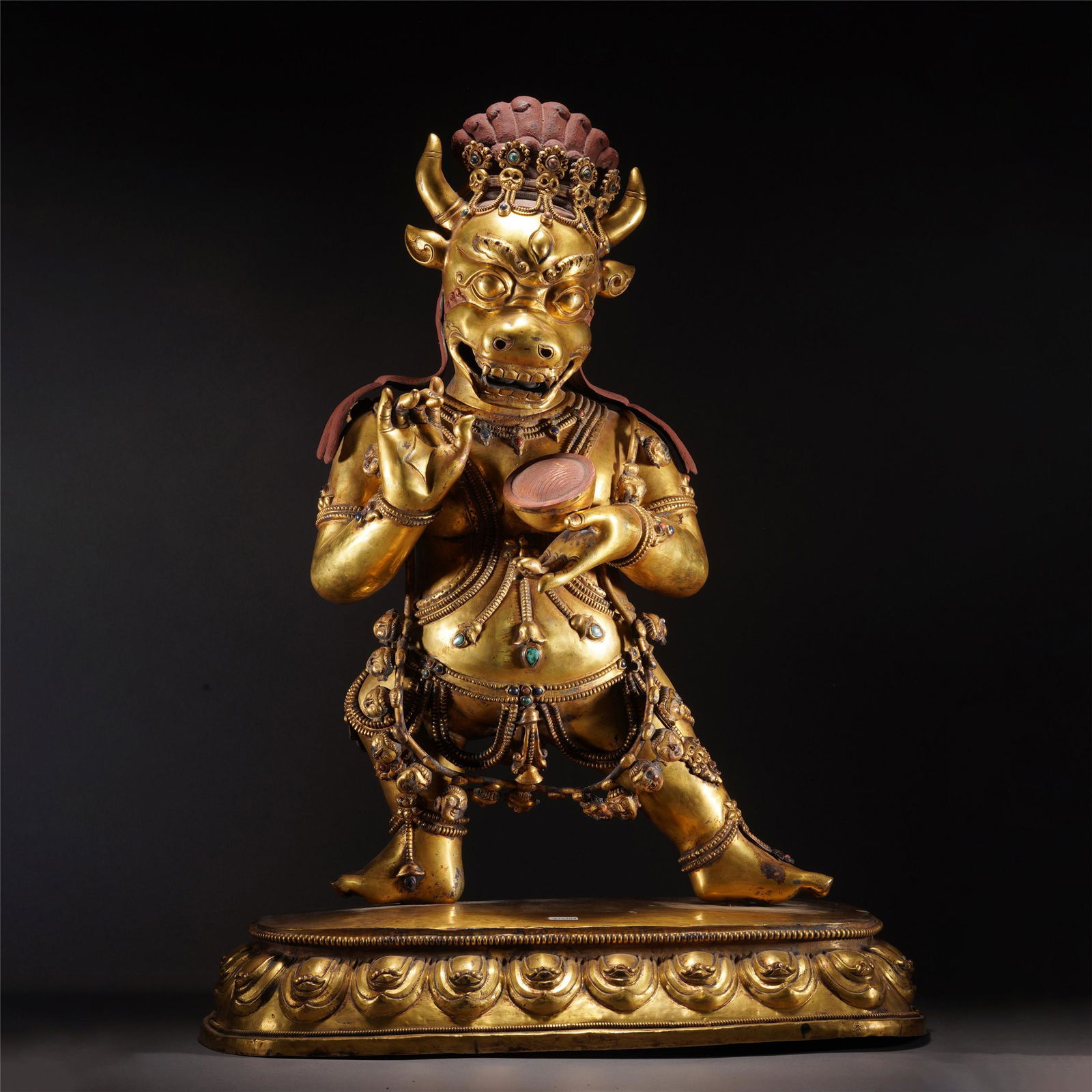 A BRONZE-GILT STANDING YAMANTAKA (1 of 12)
