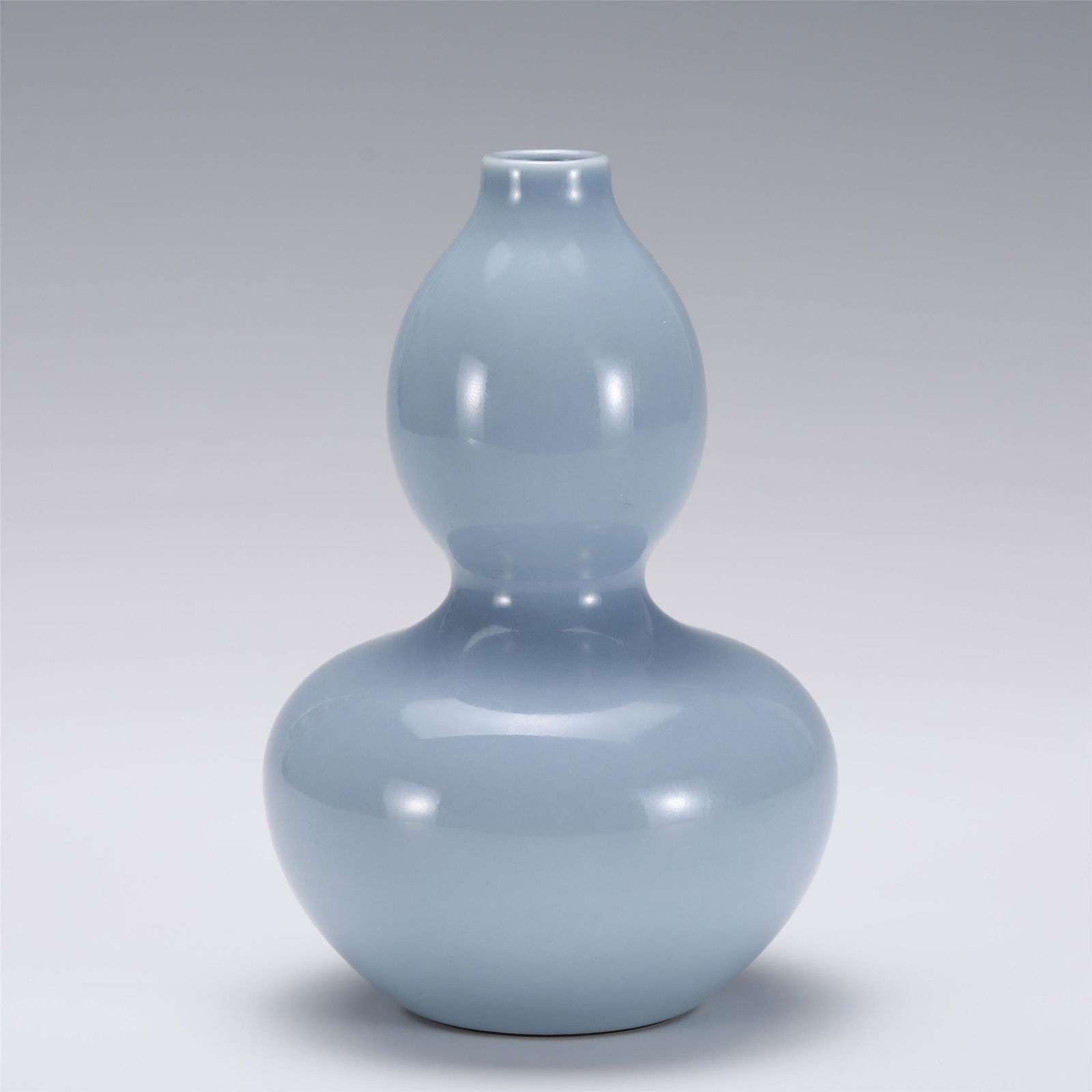 A CHINESE SKYBLUE GLAZE PORCELAIN GOURDS VASE (1 of 8)