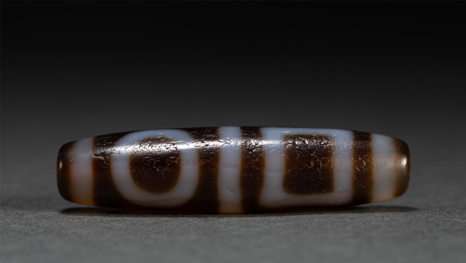 A TIBETAN DZI BEAD (1 of 10)