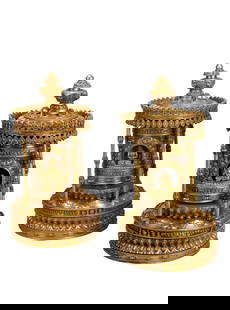 PAIR IMPORTANT SINO-TIBETAN BRONZE-GILT SHRINES: PAIR IMPORTANT SINO-TIBETAN BRONZE-GILT SHRINES The bronze-gilt niche with circular roof, the inner part of the niche containing the bronze-gilt prayer wheel with reserved shrine at the four sides, ea