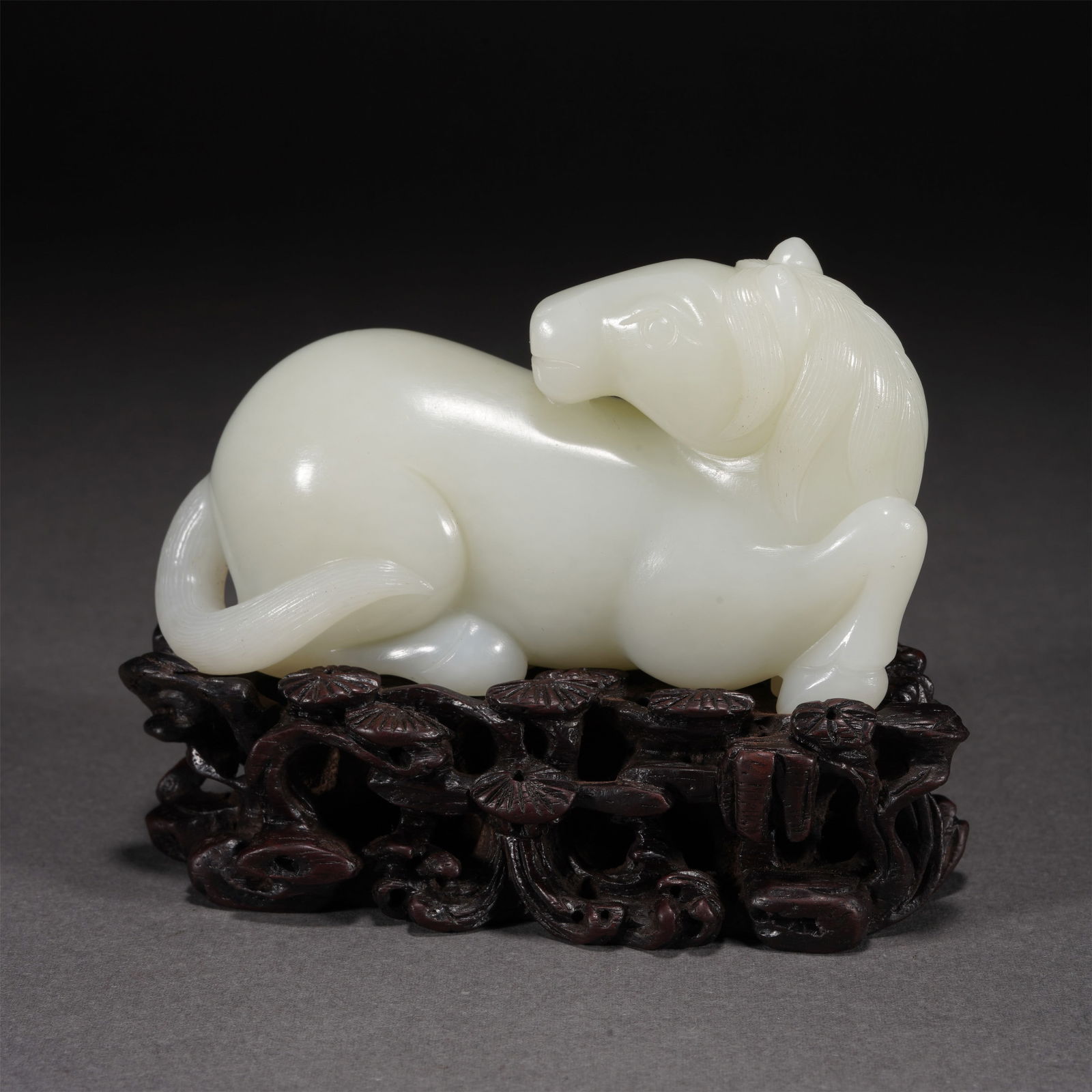 A CARVED WHITE JADE HORSE (1 of 7)