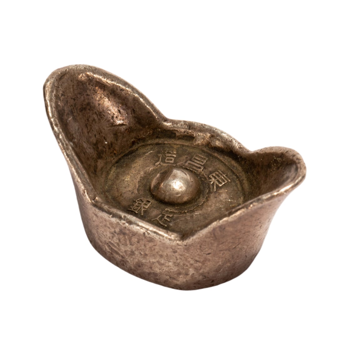 A SILVER INGOT: A SILVER INGOT Of 'boat' shape, the sides waisted in the center and flaring upwards to a high arch at the ends, the top of the interior with casting mark. Dimension: L. 4.2 cm. W. 2.2 cm. H. 2 cm. Wei