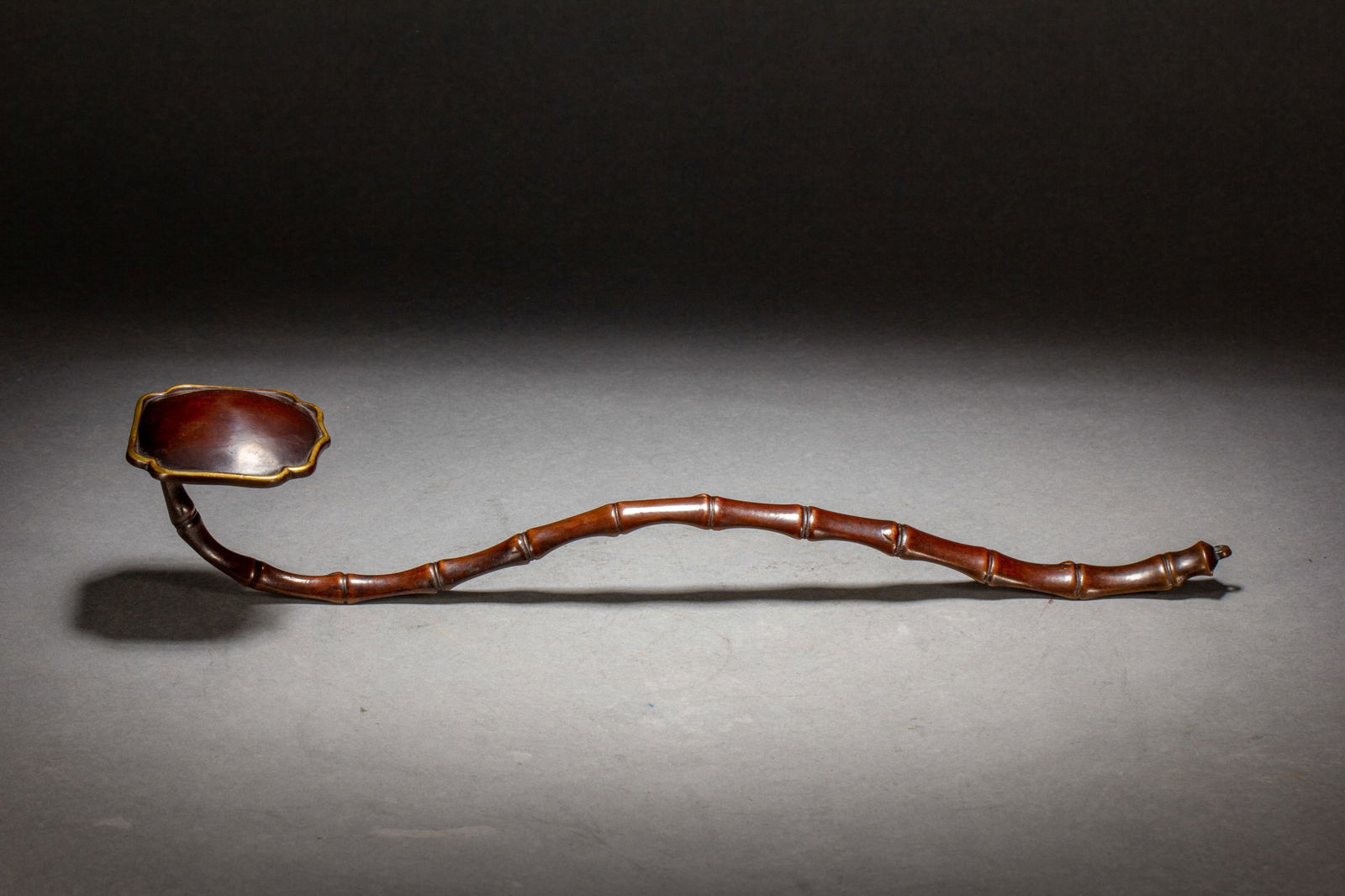 A BRONZE BAMBOO RUYI SCEPTER (1 of 10)