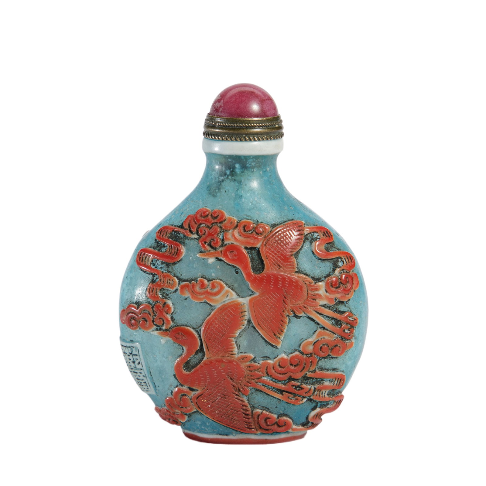 A PEKING GLASS OVERLAY SNUFF BOTTLE: A PEKING GLASS OVERLAY SNUFF BOTTLE Of flatten ovoid shape, decorated flying cranes at the exterior, with matched stopper. Dimension: L. 5.5 cm. W. 3 cm. H. 7.8 cm. Weight 55 grams.