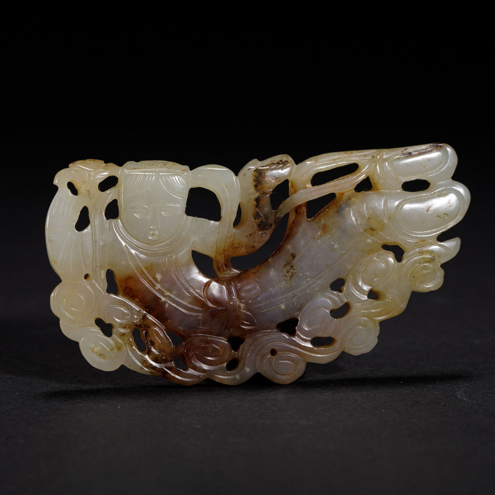 A CARVED JADE APSARAS (1 of 9)
