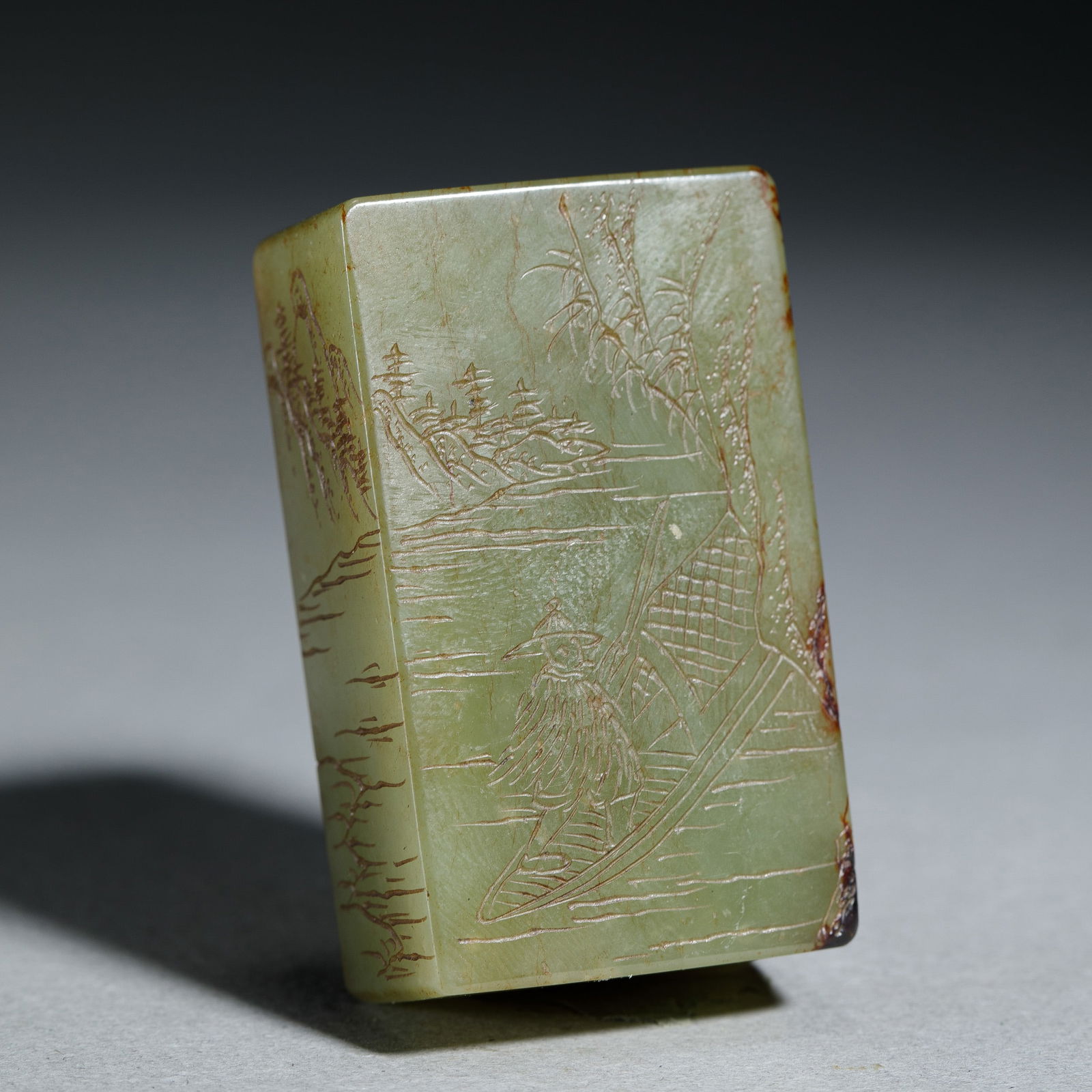 AN INCISED JADE PENDANT (1 of 9)