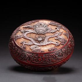 A VERY RARE CARVED CINNBAR LACQUER DRAGON BOX WITH COVER