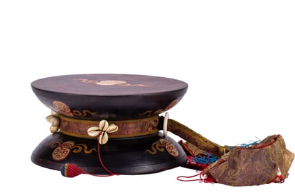 A TIBETAN DAMARU DRUM