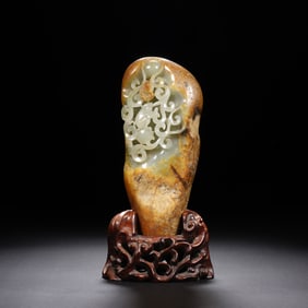 A CARVED JADE BOULDER