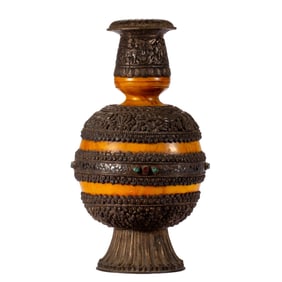 A TIBETAN SILVER ALLOY VESSEL