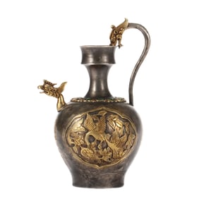 A GOLD AND SILVER PLATED PHOENIX HEAD EWER