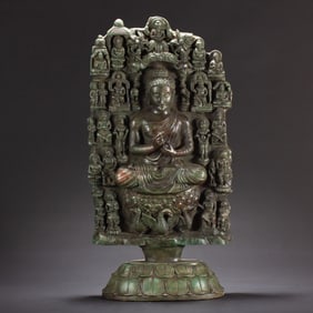 A VERY RARE BRONZE SEATED VAIROCANA