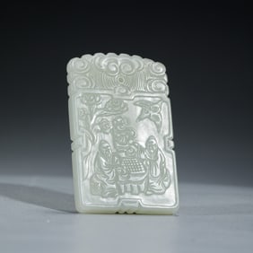 A CARVED WHITE JADE PENDANT