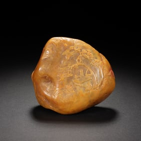 A CARVED TIANHAUNG BOULDER