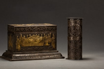 A SILVER-GILT SUTRA WITH BOX