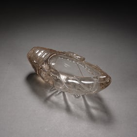 A CARVED ROCK CRYSTAL BAMBOO SPROUT FORM WASHER