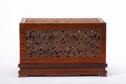 A CARVED AND RETICULATED BOX WITH COVER
