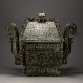 AN IMPORTANT CHINESE ARCHAISTIC BRONZE VESSEL YI