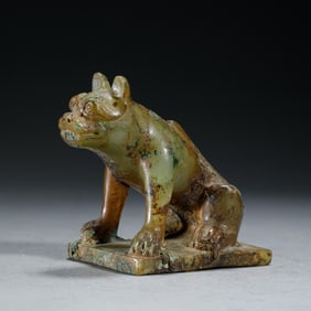 A CARVED JADE MYTHICAL BEAST