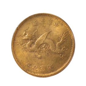 A SILVER-GILT COIN