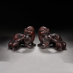 PAIR CARVED ALOES WOOD MYTHICAL BEAST