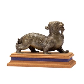 A CARVED STONE MYTHICAL BEAST BIXIE