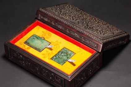 TWO CARVED JADEITE PLAQUES