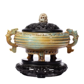 A PORCELAIN TRIPOD CENSER WITH HANDLES