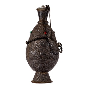 A TIBETAN SILVER ALLOY EWER