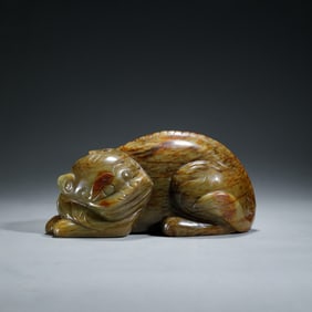 A CARVED JADE MYTHICAL BEAST