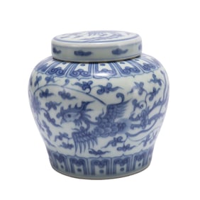 A CHINESE BLUE AND WHITE PHOENIX JAR WITH COVER