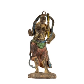 A POLYCHROME PAINTED GUARDIAN