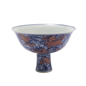 A CHINESE UNDERGLAZED BLUE AND IRON RED PORCELAIN STEM-BOWL