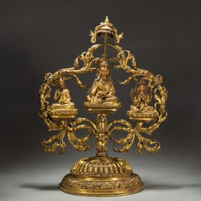 A BRONZE-GILT PADMASAMBHAVA WITH RETINUES