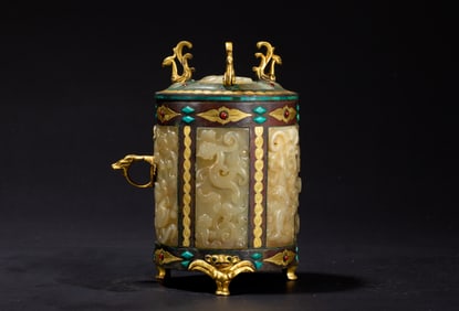 A CARVED JADE INLAID BRONZE-GILT VESSSEL