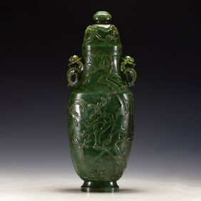 A CARVED SPINACH GREEN JADE VASE WITH COVER