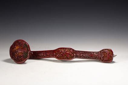 A CARVED CINNABAR LACQUER RUYI SCEPTER