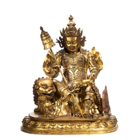 A SINO-TIBETAN BRONZE-GILT VAISHRAVANA