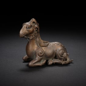 A BRONZE MYTHICAL BEAST