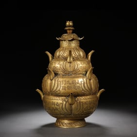 A BRONZE-GILT RELIQUARY JAR