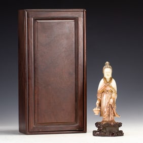 A CARVED SHOUSHAN STONE STANDING IMMORTAL MAGU