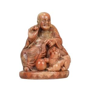 A CARVED SHOUSHAN STONE SEATED LUOHAN